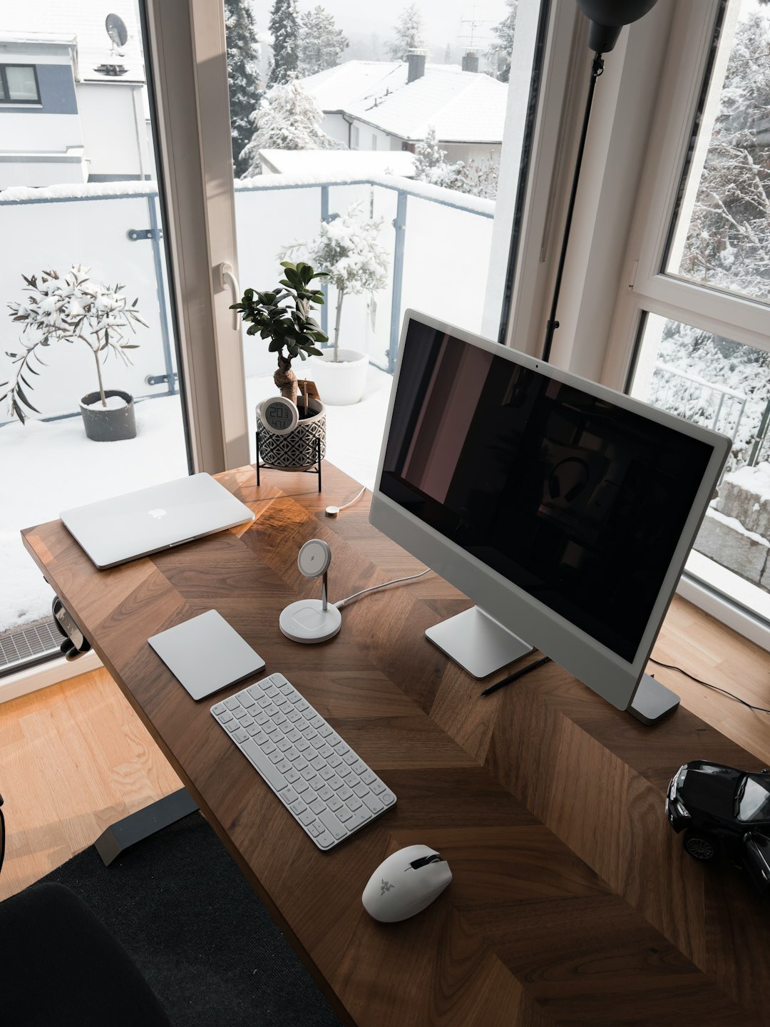 Bright Scandinavian style office workspace with wooden desks