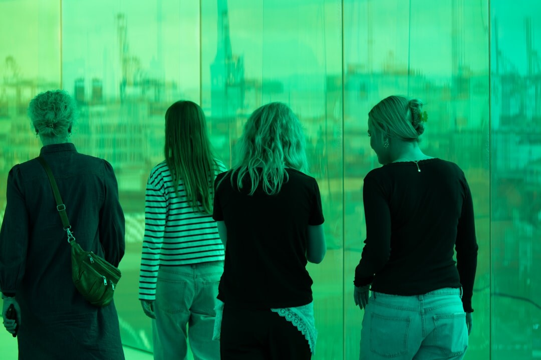Business professionals networking at an evening event in Aarhus